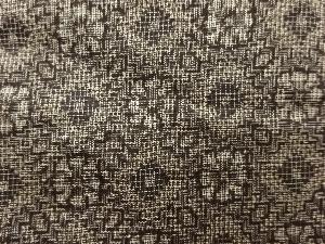 アンティーク　華紋織り出し本場泥大島紬着物（割り込み絣）